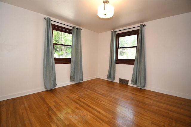 200 Graham St, Sewickley, PA 15143 - empty room with hardwood / wood-style flooring, plenty of natural light, and baseboards