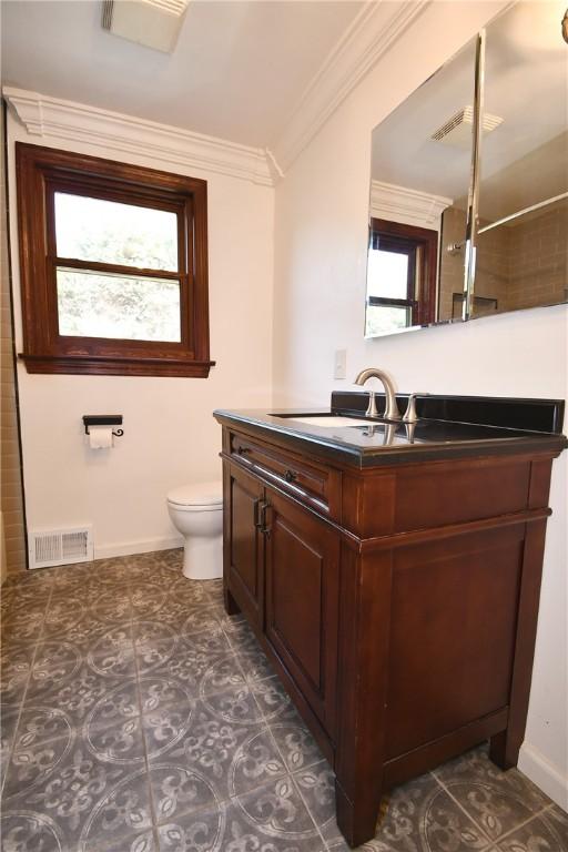200 Graham St, Sewickley, PA 15143 - full bathroom featuring crown molding, vanity, toilet, and baseboards