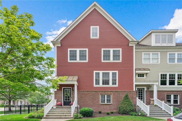 234 College Ave, Oakmont, PA 15139 - townhome / multi-family property featuring brick siding and fence