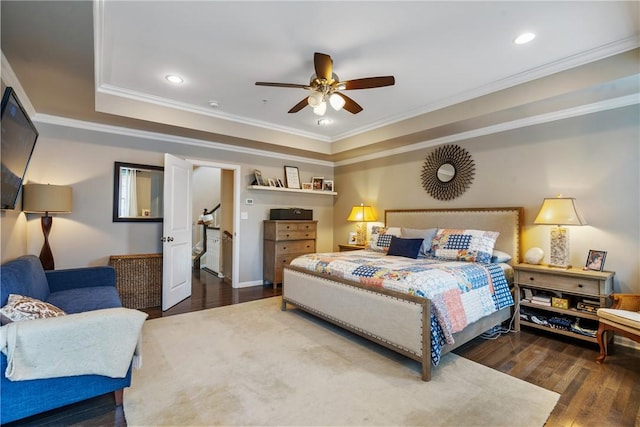 234 College Ave, Oakmont, PA 15139 - bedroom featuring wood finished floors, ornamental molding, a tray ceiling, recessed lighting, and ceiling fan
