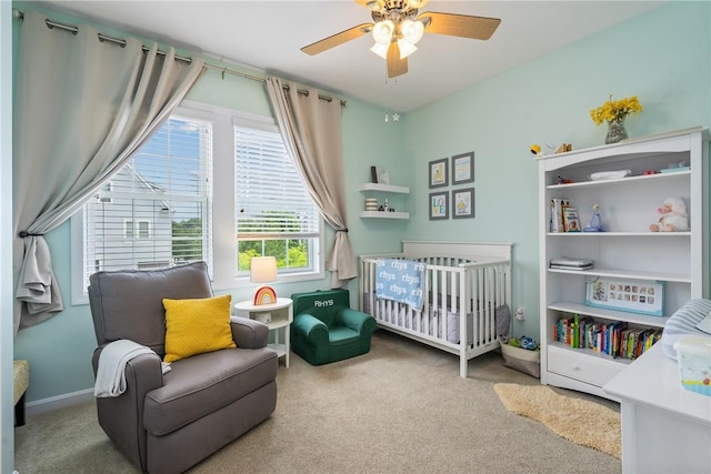 234 College Ave, Oakmont, PA 15139 - carpeted bedroom with a nursery area, ceiling fan, and baseboards