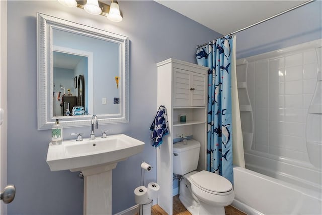 234 College Ave, Oakmont, PA 15139 - bathroom with toilet and shower / tub combo with curtain