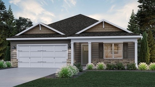 view of front of house with an attached garage, concrete driveway, and roof with shingles