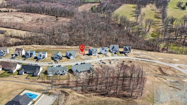 aerial overview of property's location featuring nearby suburban area