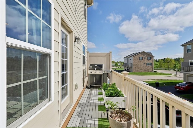 balcony with area for grilling