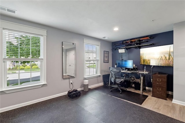 home office featuring baseboards and recessed lighting