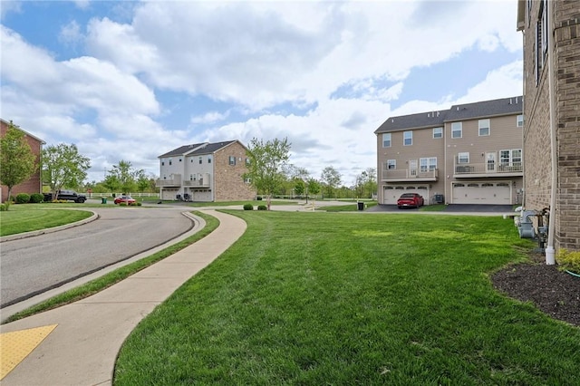 view of community featuring a lawn