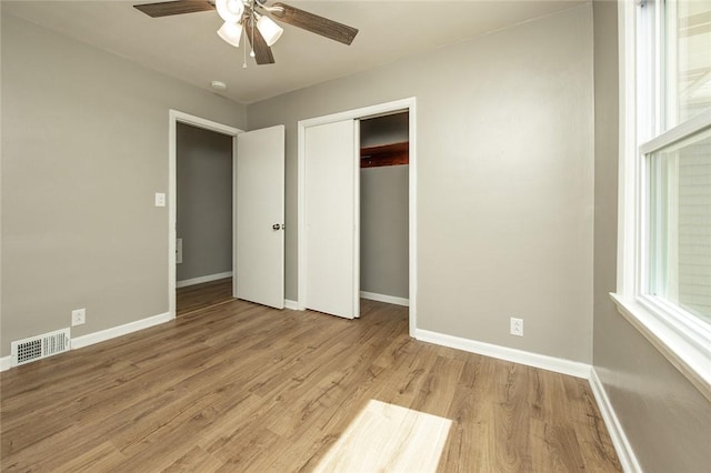 745 N Broad St, Pine Twp Mer, PA 16127 - unfurnished bedroom with baseboards, light wood-type flooring, a closet, and ceiling fan