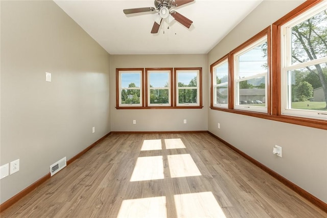 745 N Broad St, Pine Twp Mer, PA 16127 - empty room with healthy amount of natural light, baseboards, and light wood-type flooring