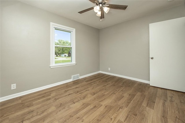 745 N Broad St, Pine Twp Mer, PA 16127 - empty room with wood finished floors, baseboards, and a ceiling fan