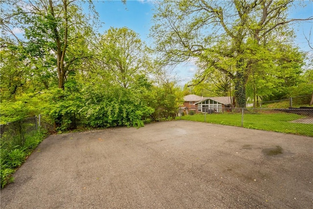 view of patio featuring fence