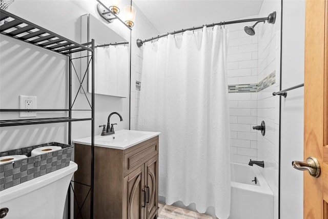 full bath featuring vanity, shower / bathtub combination with curtain, and toilet