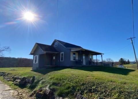 336 Walkchalk Rd, East Franklin Twp, PA 16201 - view of front of home with a front yard and covered porch