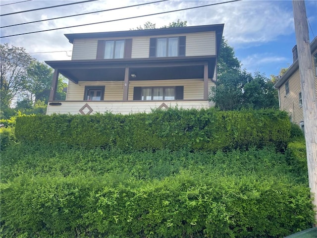 view of front of property featuring covered porch