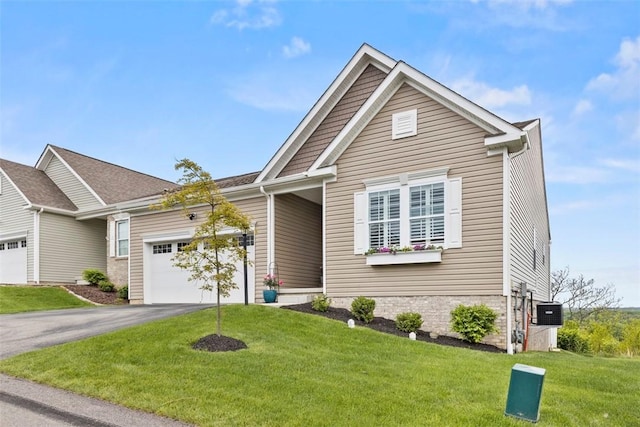 view of front of property with an attached garage, asphalt driveway, a front lawn, and cooling unit