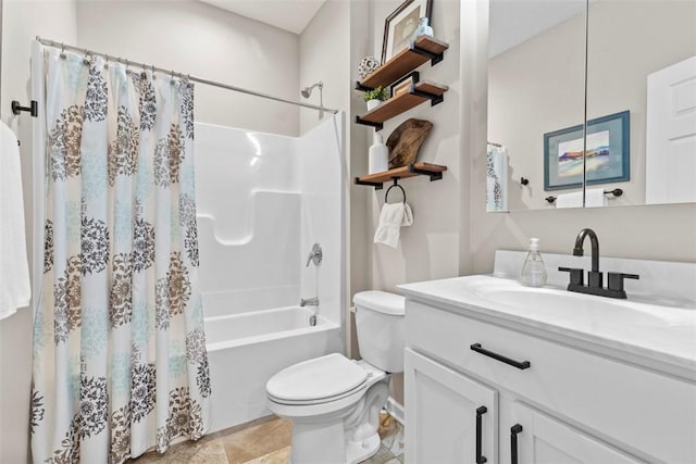 bathroom with toilet, vanity, shower / bath combo with shower curtain, and baseboards