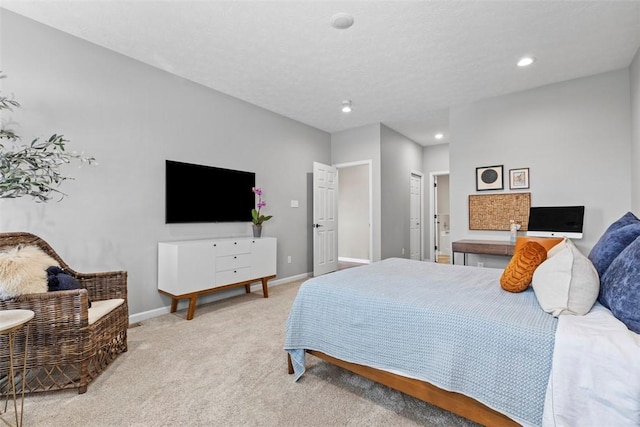 carpeted bedroom featuring recessed lighting and baseboards