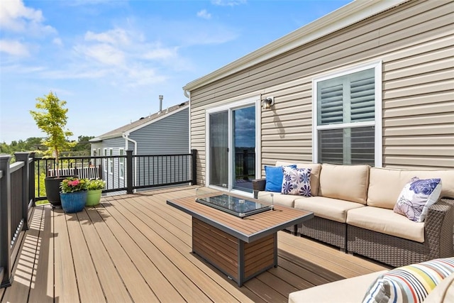 wooden deck featuring an outdoor hangout area