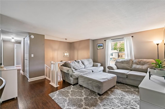 3613 Falmouth Dr, South Park, PA 15129 - living area with dark wood-style floors and baseboards