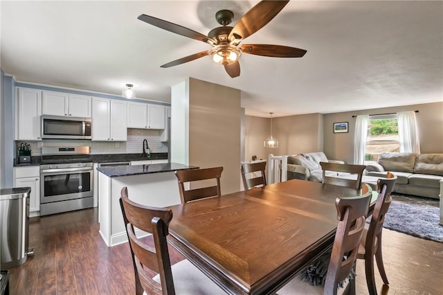 3613 Falmouth Dr, South Park, PA 15129 - dining area featuring dark wood finished floors and ceiling fan
