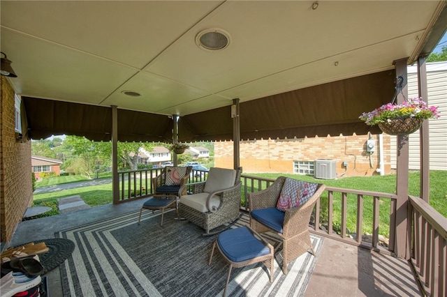 423 Nantucket Dr, Pleasant Hills, PA 15236 - wooden deck featuring central AC, a lawn, and covered porch