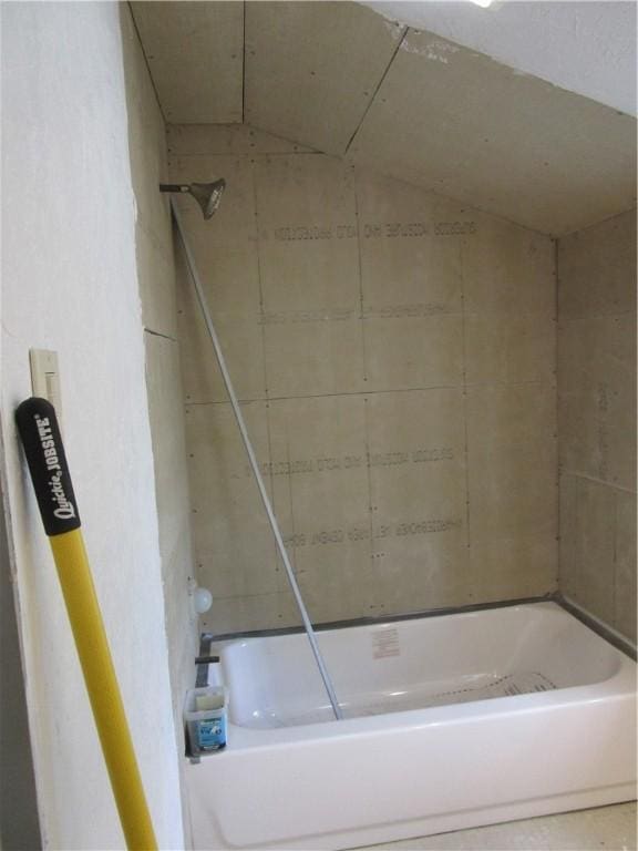 full bathroom featuring a tub and a shower