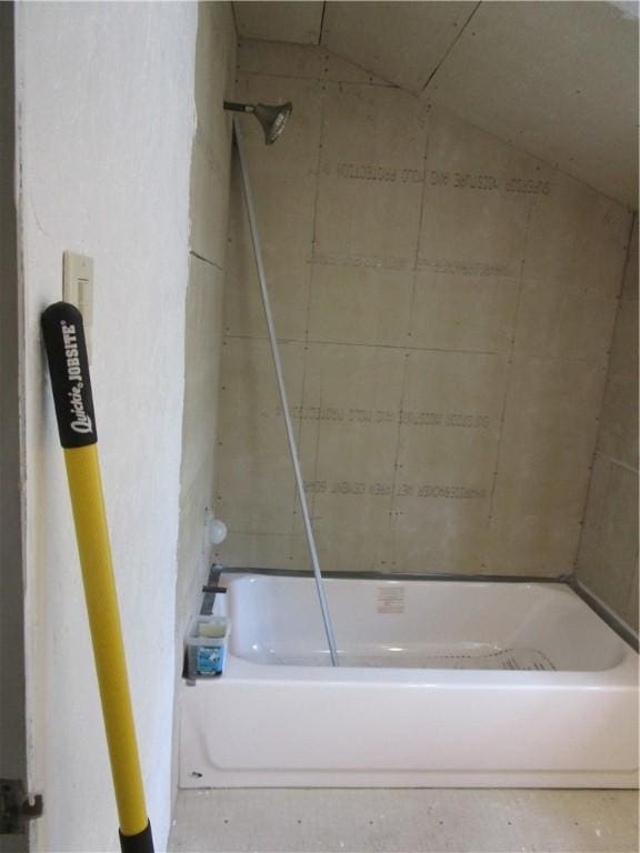 bathroom featuring a bath and a shower
