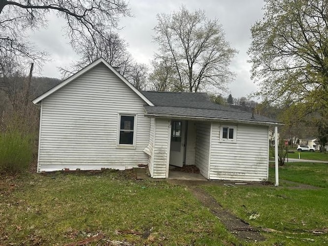 2 Morgan St, South Fayette, PA 15064 - rear view of property with a yard and a shingled roof