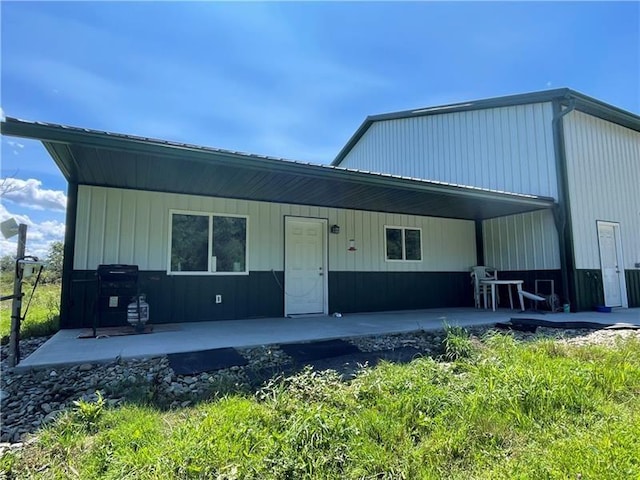 171 N Maysville, West Salem Twp, PA 16125 - rear view of house with a patio