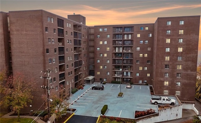 5600 Munhall Rd Unit 403, Squirrel Hill, PA 15217 - property at dusk with a view of apartment building / complex