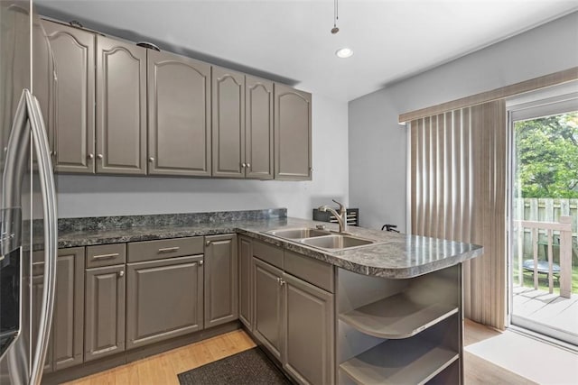 607 Tripoli St, Central North Side, PA 15212 - kitchen with a sink, stainless steel fridge, gray cabinetry, open shelves, and recessed lighting