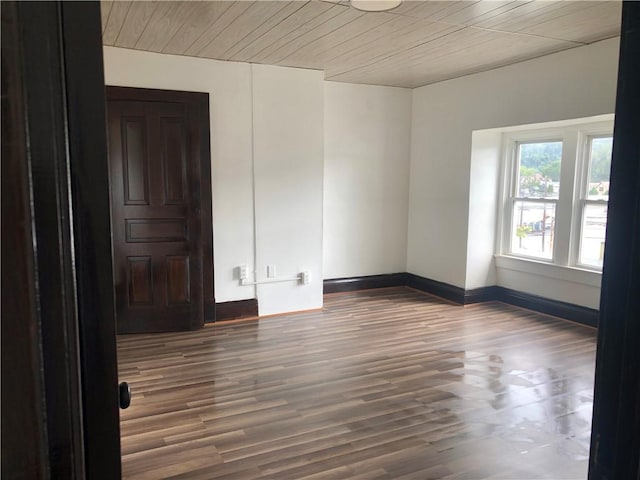 835 6th Ave, Brackenridge, PA 15014 - unfurnished room featuring wooden ceiling, wood finished floors, and baseboards