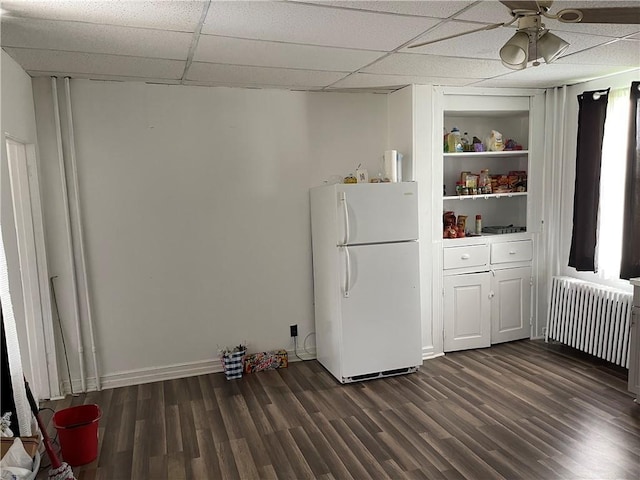 835 6th Ave, Brackenridge, PA 15014 - laundry room featuring radiator heating unit, dark wood-style flooring, built in features, and ceiling fan