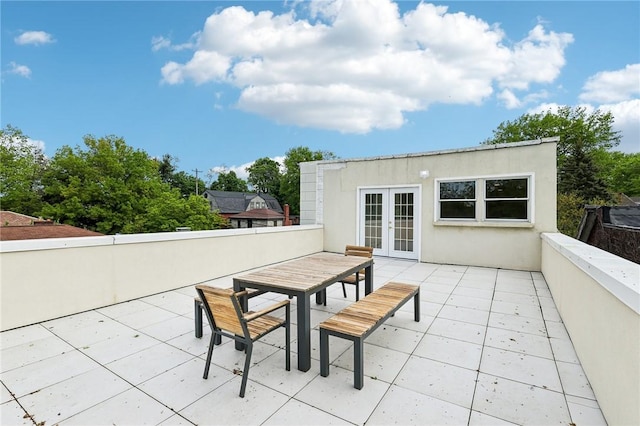 view of patio featuring french doors and outdoor dining space