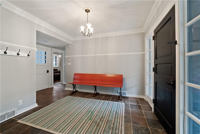 entryway featuring a chandelier, baseboards, crown molding, and stone tile flooring