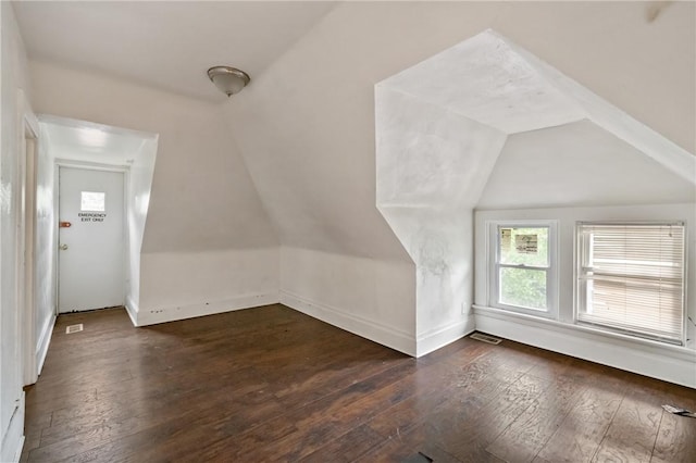 1608 Union Ave, Mckeesport, PA 15132 - additional living space with lofted ceiling, dark wood-style flooring, and baseboards