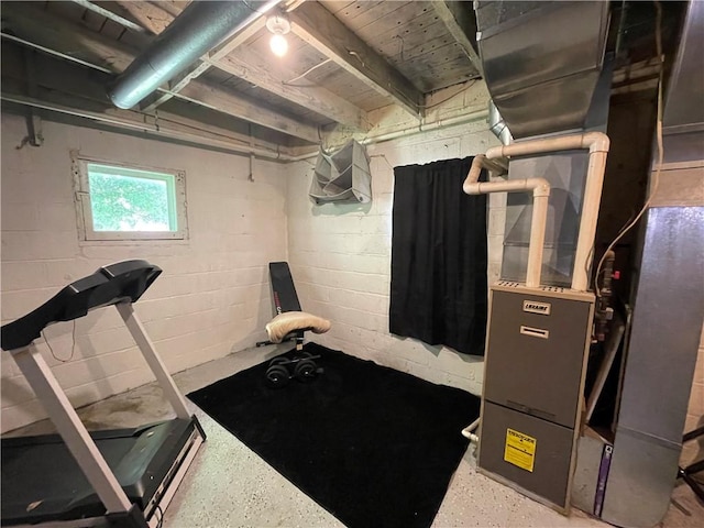 basement featuring concrete block wall