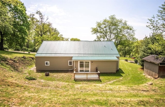 1435 Orchard St, New Sewickley Twp, PA 15042 - back of house with a yard, metal roof, and a deck