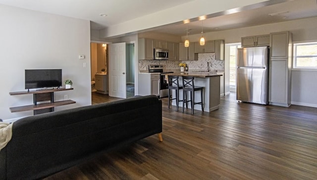 1435 Orchard St, New Sewickley Twp, PA 15042 - living area with dark wood-style flooring, baseboards, and recessed lighting