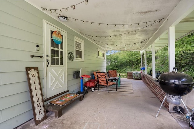 view of patio featuring a porch
