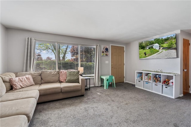 living area with carpet flooring and baseboards
