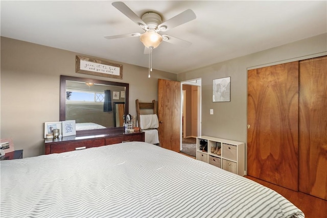 bedroom with a closet and a ceiling fan
