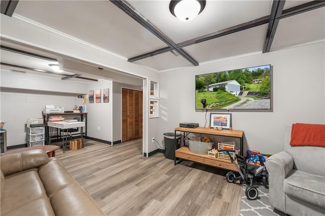 living area featuring wood finished floors, an office area, coffered ceiling, baseboards, and beam ceiling