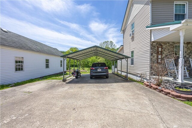 135 Oak Forest Rd, New Freeport, PA 15316 - view of car parking featuring a carport and driveway