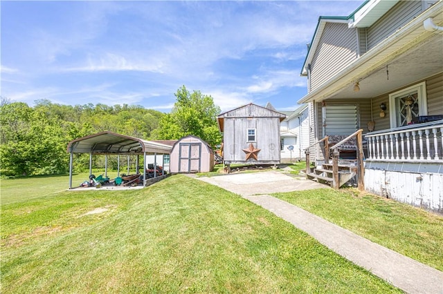 135 Oak Forest Rd, New Freeport, PA 15316 - view of grassy yard with a shed, a carport, an outbuilding, and covered porch