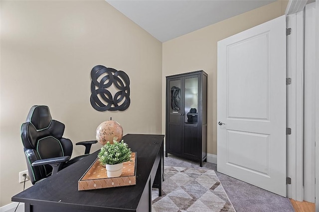 office space with light colored carpet and baseboards