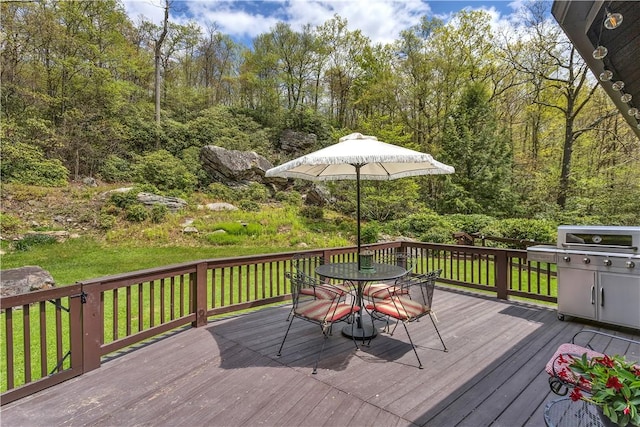 2847 National Pike, Wharton Twp, PA 15421 - deck with outdoor dining space and a forest view