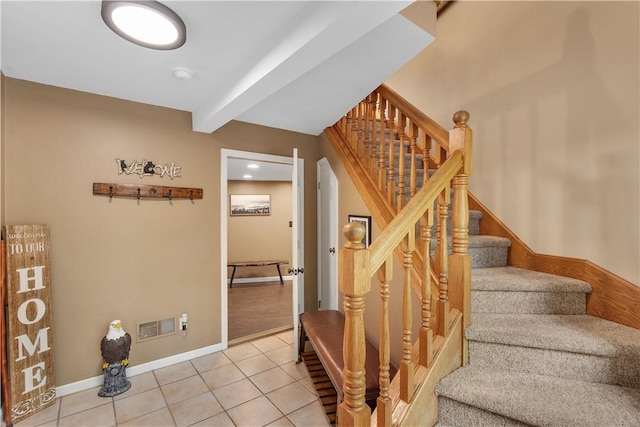 2847 National Pike, Wharton Twp, PA 15421 - stairs with tile patterned flooring, baseboards, and beamed ceiling