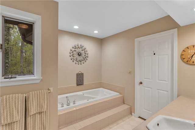 2847 National Pike, Wharton Twp, PA 15421 - bathroom with a sink, a garden tub, baseboards, and recessed lighting
