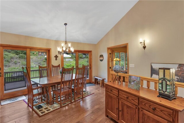 2847 National Pike, Wharton Twp, PA 15421 - dining area with a chandelier, wood finished floors, and high vaulted ceiling